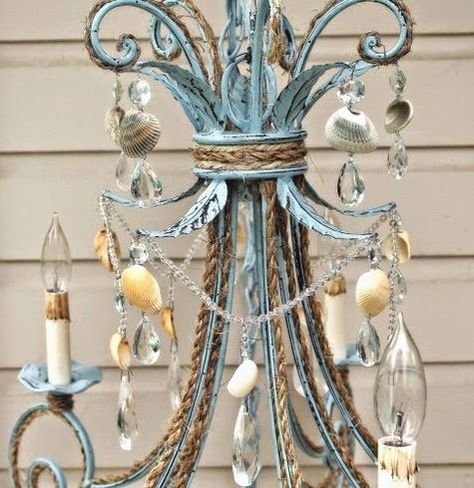 Have fun with your chandelier and decorate it...http://www.completely-coastal.com/2014/06/DIY-beach-chandelier-ideas.html Hanging Shells Decor, Living Chandelier, Beach Chandelier, Seashell Chandelier, Decor Marin, Shabby Chic Chandelier, Chandelier Makeover, Coastal Chandelier, Blue Shabby Chic