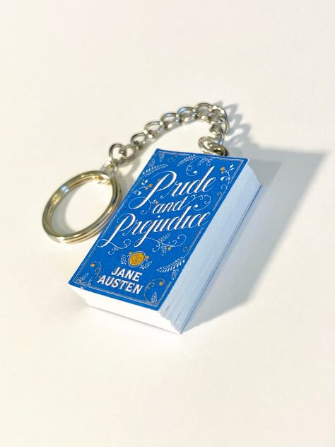 This item is handmade to order with every buyer in mind. With that said, each necklace is made with precision, care, and love! Perfect as a gift for a book lover in your life or for your own use. Book Keychain, Classics Book, Book Aesthetics, Keychain Gift, Pride And Prejudice, Classic Books, Book Accessories, Book Lover, Bookstore