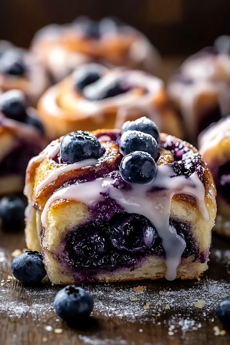 Blueberry Cinnamon Rolls Decadent Breakfast Recipes, Christmas Blueberry Recipes, Recipes With Blueberry Jam, Fruity Cinnamon Rolls, Blueberry And Cream Sweet Buns, Tiramisu Cinnamon Rolls, Lemon Blueberry Rolls, Blueberry Sticky Buns, Gourmet Christmas Desserts