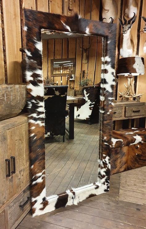 Cow Inspired Bathroom, Rustic Mirror Bedroom, Western Bedroom Mirror, Cow Theme Home Decor, Cow Hide Mirror Frame, Cow Print Mirror Frame Diy, Diy Western Mirror Frame, Cowhide Mirror Frame, Cowboy Diy Decor