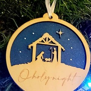 Nativity Ornaments Diy Cricut, Nativity Scene On Wood Slice, Wood Ornaments Diy Tree Slices Nativity, Round Wood Christmas Signs Diy Nativity Scene, Wood Burned Nativity Ornaments, Baby Jesus Ornament, Nativity Stable, Religious Ornaments, Laser Cut Decor