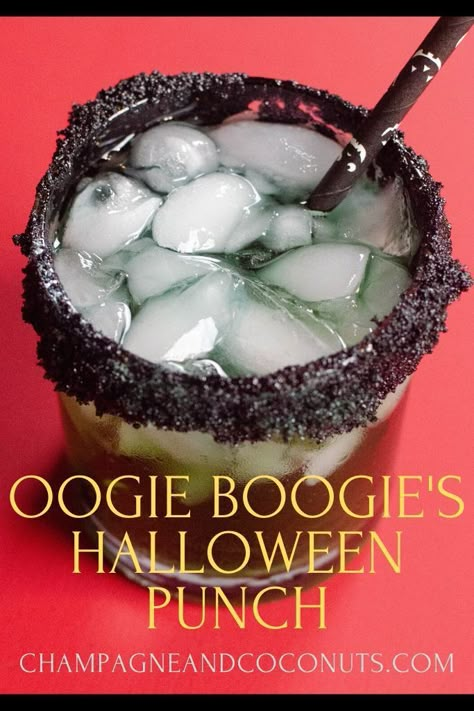 Get ready, Tim Burton fans, because we've got a drink you'll love - our Nightmare Before Christmas inspired cocktail - Oogie Boogie's Halloween Punch! It will knock your burlap sack right off and be the hit of your Halloween party. Be sure to serve some for Jack and Sally, and maybe even Santa Claus too! #oogieboogie #nightmarebeforechristmas #halloween #halloweenpunch #halloweendrinks #midori #kinkyappleliquor #cocktails #mixeddrinks #halloweenparty Christmas Alcohol Drinks, Tim Burton Party, Fun Halloween Drinks, Halloween Themed Drinks, Christmas Alcohol, Disney Cocktails, Halloween Punch Recipes, A Nightmare Before Christmas, Christmas Drinks Alcohol