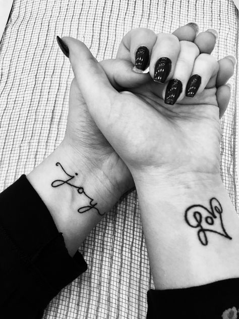 Cute, simple wrist tattoos. Joy and Love. #wristtatoos #joy #love #sistertattoos Joy Tattoos For Women, Joy Tattoo Ideas Design, Joy Symbol Tattoo, Pure Joy Tattoo, Joy Tattoo Ideas Symbols, Joy Wrist Tattoo, Choose Joy Tattoo, Joy Tattoo, Infinity Tattoo On Wrist