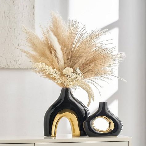 Amazon.com: XGZY Modern Ceramic Donut Vase: Set of 2 -Minimalist Nordic Black and Gold Hollow Vase Home Decor for Kitchen Dining Table Centerpieces Living Room Bederoom Entryway Weddin : Home & Kitchen Entryway Table Decor Black And Gold, Cream Black Gold Living Room, Black Gold Kitchen Decor, Black White And Gold Living Room Decor, Black And Gold Elegant Party Decorations, Black White Gray Gold Living Room, Black And Gold Powder Room, Black And Gold Kitchen Decor, Gold And Black Decor