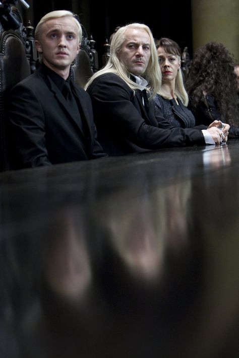 Lucius, Narcissa and Draco look scared at Voldemort's table in Malfoy Manor Malfoy Family, Draco Malfoy Aesthetic, Jason Isaacs, Buku Harry Potter, Lucius Malfoy, Tom Felton Draco Malfoy, Images Harry Potter, Draco Harry Potter, Harry Potter Draco Malfoy