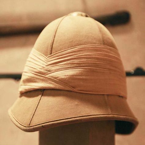 victorian Pith helmet.. The pith helmet (also known as the safari helmet, sun helmet, topee, sola topee, salacot or topi is a lightweight cloth-covered helmet made of cork or pith, typically pith from the sola, Aeschynomene aspera, an Indian swamp plant, or A. paludosa, or a similar plant. Designed to shade the wearer's head and face from the sun, pith helmets were often worn by people of European origin in the tropics, but have also been used in other contexts. Bengal Lancer, Pith Helmet, British Uniforms, Explorers Club, British India, Steampunk Hat, British Khaki, Steampunk Costume, Hat Stands