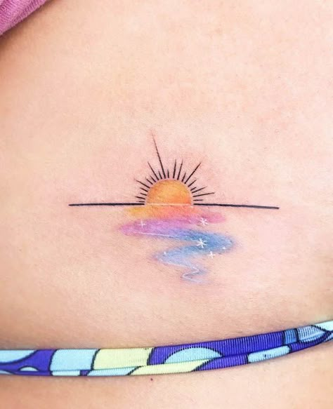 Sun Rise Tattoo Color, Watercolor Friendship Tattoo, Tattoos With Watercolor, Watercolor Travel Tattoo Ideas, Small Sunset Tattoos For Women, Water And Sun Tattoo Ideas, Colorful Sunrise Tattoo, Watercolour Sun Tattoo, Delicate Hawaiian Tattoo