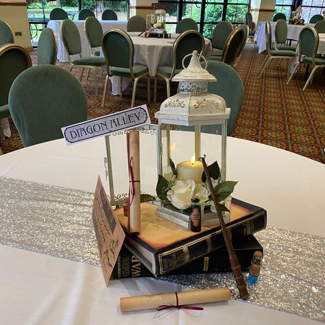 Harry Potter Wedding Centerpieces Diy, Harry Potter Centerpieces Wedding, Harry Potter Centerpiece Ideas Diy, Hogwarts Centerpiece Ideas, Harry Potter Baby Shower Table Centerpieces, Harry Potter Wedding Table Decorations, Harry Potter Centerpiece Ideas Weddings, Harry Potter Table Centerpieces, Harry Potter Centerpieces