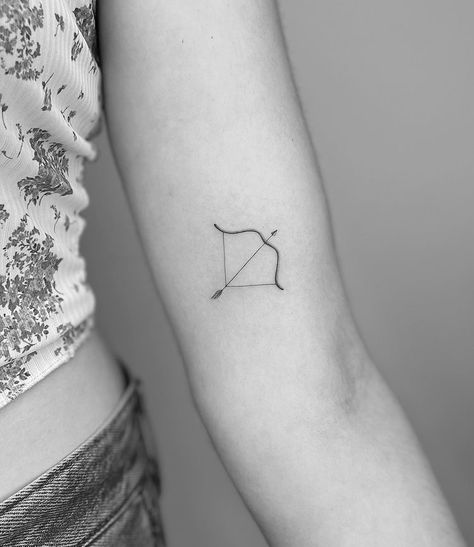 Archer Tattoo Minimalist, Mini Arrow Tattoo, Mini Bow And Arrow Tattoo, Small Tattoos Arrow, Minimalist Bow And Arrow Tattoo, Greek Bow And Arrow Tattoo, Cupid’s Bow Tattoo, Arrow Tattoo Aesthetic, Heart Bow And Arrow Tattoo