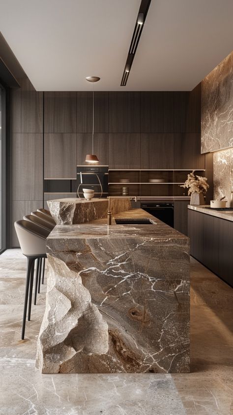 Stone Interior Design Modern, Premium Kitchen Design, Dramatic Kitchen Island, Marble Kitchen Island Ideas, Iceland Kitchen Design, Rock Kitchen Island, Luxury Kitchen With Island, Marble Island Kitchen, Wood And Marble Kitchen