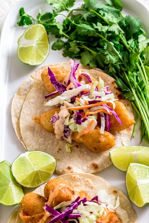 Baja Fish Tacos | Beer-Battered Fish Taco Recipe | Confetti & Bliss Baja Tacos, Cod Fish Tacos, Fish Tacos With Cabbage, Tilapia Tacos, Fried Fish Tacos, Fish Taco Recipe, Battered Fish Tacos, Beer Battered Fish Tacos, Fish Taco Sauce