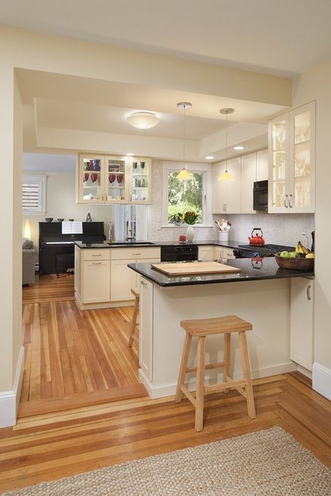 10 Ways to Disguise a Kitchen Soffit — Kitchen Design | The Kitchn - This is a cool way to solve a problem - too much room between cabinets and ceiling - and add a little drama at the same time. Small U Shaped Kitchens, Small U Shaped Kitchen, Kitchen Soffit, U Shaped Kitchen, Kitchen Ceiling, Kitchen Plans, Kitchen Remodeling Projects, Room Remodeling, Kitchen Remodel Idea