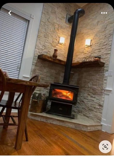 Rustic Woodburning Stove Ideas, Rock Behind Wood Stove, Pellet Stove Brick Wall, Wood Stove Steamer Scents, Corner Wood Burning Fireplace Ideas, Wood Stove Corner Ideas Living Room, Wood Burner Corner, Wall Behind Pellet Stove Ideas, Freestanding Wood Stove Hearth Ideas