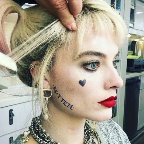 Harley Quinn Makeup Margot Robbie, Harley Quinn Tattoos In Movie, Harley Quinn Tattoo Placement, Harley Quinn Earrings, Harley Quinn Makeup Looks, Harley Quinn Face Tattoo, Harley Quinn Eye Makeup, Harley Queen Costume, Harley Queen Tattoo