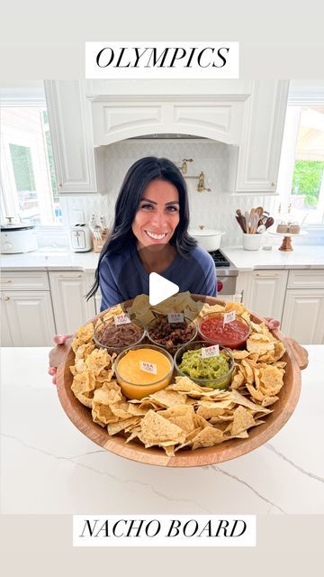 Carla Bushey - Always keepin’ it real on Instagram: "With a nacho board like this, I want to watch the Olympics all day long 😂🙈. One of my favorite snacking boards that I can always make on repeat! 
.
Comment the word NACHOS and I’ll send you the recipe with everything I used to make this fun board, right to your DM! 
.
#nachos #olympics #summerolympics #olympics2024 #themedparty #entertainingathome #summerrecipes #texmex" Super Nacho Platter, Nachos Charcuterie Board, Charcuterie Board Nachos, Olympic Charcuterie Board, Nacho Board, Nacho Board Ideas, Game Day Nachos, Olympic Food Ideas, Nacho Charcuterie Board