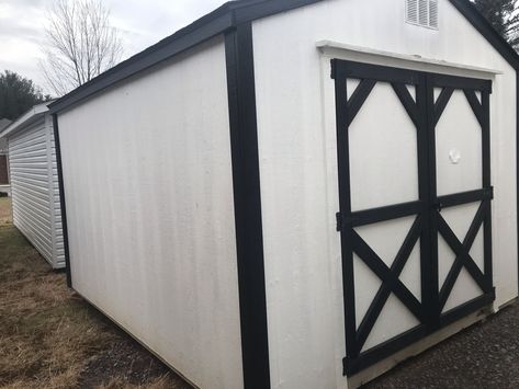 10 x 12 painted smart shed. White siding w/ black trim & black architectural shingles.  72" double doors & 16" on center construction. Other sizes & colors available. Limited lifetime warranty. Sales tax not included. FREE delivery up to 50 miles. #shed #shedideas #shedsdirect Tri Statw Block & Pool White And Black Shed Exterior, Black And White Shed Exterior, White And Black Shed, White Shed Black Trim, Black And White Shed, Shed Paint Colours, White Shed, Porch Gable, Camp Room