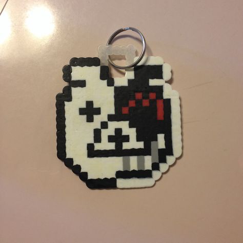 Perler bead project: Danganronpa Monokuma bear keychain. Danganronpa Monokuma, Pixel Beads, Hamma Beads, Bear Keychain, Dangan Ronpa, Bead Projects, Melty Beads, Diy Perler Beads, Bead Ideas