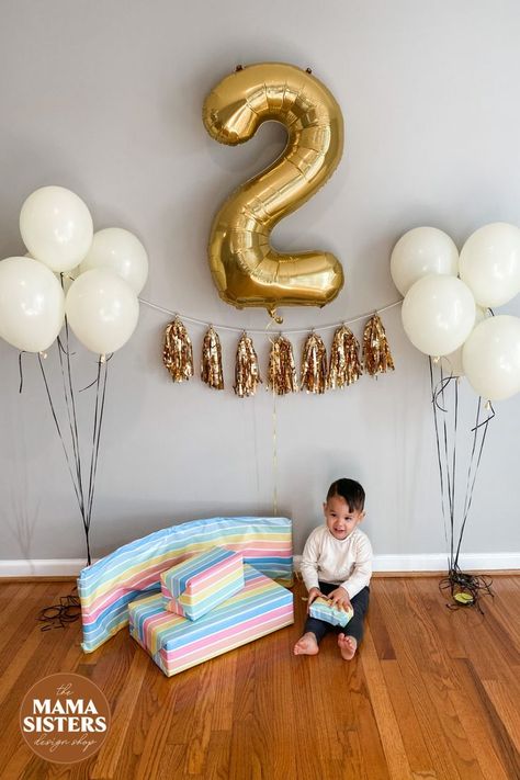 a little kid with gifts and a big 2 gold balloon and white balloons Simple Second Birthday, Second Birthday Decorations, Gold Birthday Banner, 2 Balloon, Simple Birthday Decorations, Simple Birthday, White Balloons, Gold Birthday, Birthday Decor