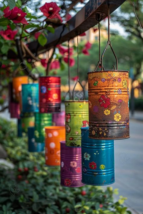 33 Creative DIY Yard Art Ideas You’ll Love To Craft 29 Upcycled Windchimes Diy, Painted Tin Cans Diy, Recycled Tin Can Crafts, Fall Yard Decorating Ideas, Recycle Decoration Ideas, Tin Can Wind Chimes Diy, Recycle Art Projects, Diy Recycle Ideas, Upcycling Cans