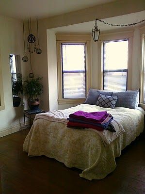 bed in bay window. I like this Bay Window Behind Bed, Bed In Front Of Bay Window, Bed In Bay Window, Bay Window Bedroom Layout, Bed Bay Window, Budapest Apartment, Bay Window Bed, Bedroom With Bay Window, Ocd Thoughts