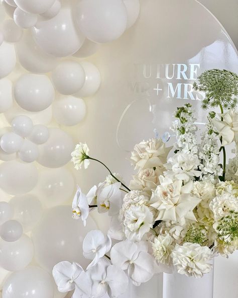 Confetti Party Hire on Instagram: “Future Mr + Mrs Croft ... Backdrop, decal, plinths and balloons by us @confettipartyhire Flowers @flowersofwillow Cake…” Hens Backdrop, White Bachelorette Backdrop, Hens Photo Wall, White Flower Wall With Balloons, Hens Signage, White Bride Balloons Bachelorette, Party Hire, Engagement Parties, Confetti Party