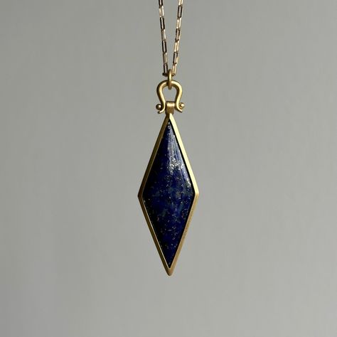 This otherworldly lapis pendant holds a galaxy within its sleek gold bezel, topped with Monika Krol's signature lyre bail. 18k yellow gold Lapis, 19.53ct, 15mm x 40mm (9/16" x 1 9/16")Chain is 23" long Wizard Jewelry, Faberge Jewelry, Gem Pendant, Lapis Pendant, Newport Ri, Allegiant, Jewelry Fashion Trends, Girly Jewelry, Lovely Jewellery