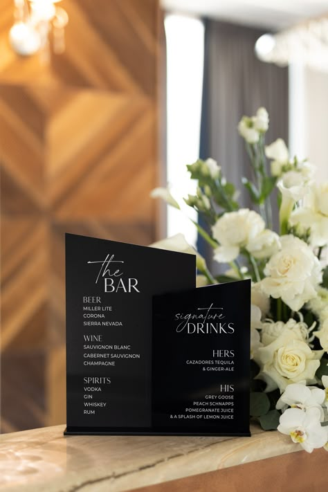 "Modern Black Acrylic Wedding Bar Sign - Signature Drink Sign - Wedding Bar Menu with Stand - Wedding Signage - Wedding Drink Menu Sign   Introducing our Modern Black Acrylic Wedding Bar Sign, the perfect addition to your wedding bar menu! Crafted from high-quality black acrylic, this elegant sign will add a touch of sophistication and modern style to your wedding reception. Featuring beautiful white lettering, this sign is designed to showcase your signature drink menu or bar menu in style. The Black Color For Wedding, Wedding Sign Minimalist, Black White And Gold Wedding Reception Decor, Black And White Acrylic Wedding Sign, Black And White Bar Sign Wedding, Black Bar Sign Wedding, Modern Signature Drink Sign, Black And White Bar Sign, Bar Menu Wedding Sign Acrylic