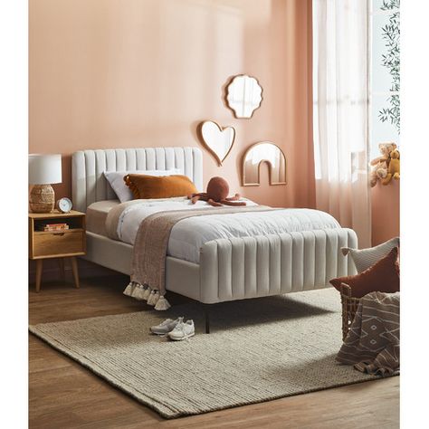 Elevate your kid's bedroom with a new, striking centrepiece. This elegant bed is upholstered in a linen-look fabric in a neutral hue, and its panelled headboard and footend are generously padded for added comfort. The understated bed suits all bedding styles and colours, so it's a brilliant foundation for layering.