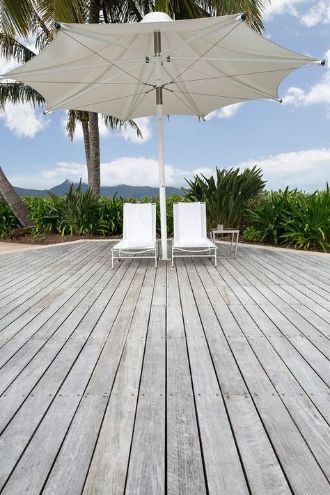 The trend for grey timber decks is more popular than ever. However, while simply leaving the timber untreated and open to the elements will achieve the grey look, you risk sacrificing… Deck Colours, Piscina Container, Decks Around Pools, Grey Deck, Kleiner Pool Design, Wooden Pool, Piscina Intex, Deck Flooring, Best Above Ground Pool