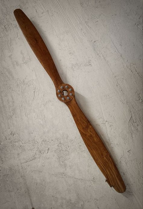 Wooden Propeller Industrial Wall Decor
Add your own vintage charm to your space and create aviation art with this large wooden wall decor in the shape of a propeller casing. Industrial Wall Decor, Vintage Aviation, Wooden Wall Decor, Aviation Art, Wooden Walls, Wood Species, Vintage Charms, Decorative Items, Carving