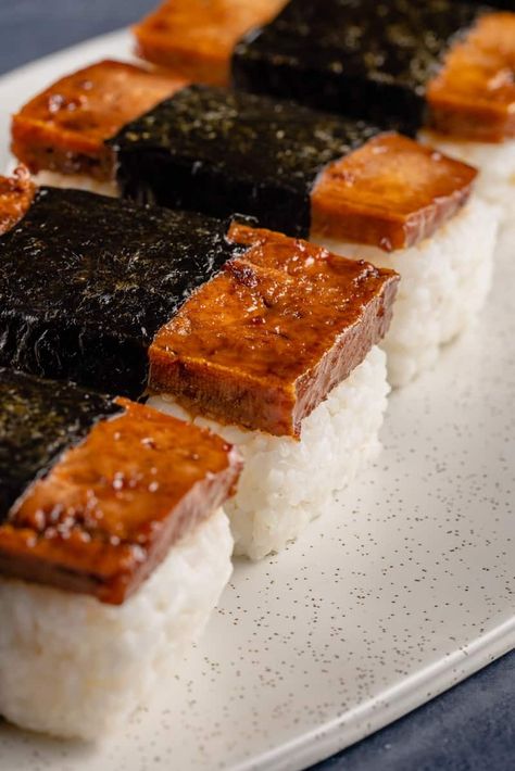 This tofu musubi is a vegan twist on the popular Spam musubi. It’s just as flavorful, easy to make, and perfect for vegan lunchboxes, a protein-packed snack, or a hearty vegan appetizer. #tofumusubi #musubi #veganmusubi #spammusubi #veganspam #vegan #sweetsimplevegan #lunch #appetizer #veganprotein Tofu Musubi, Cooking Sushi Rice, Musubi Recipe, Vegan Miso Soup, Cooking Goals, Tofu Marinade, Vegan Coleslaw, Cooking Tofu, Spam Musubi