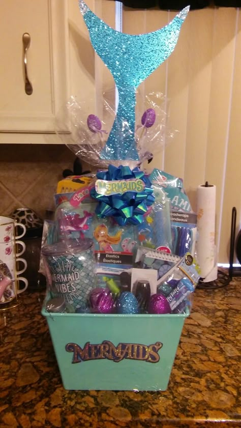 Mermaid Easter Basket#easter#flower#bunny#pastels #easterbunny#giftideas#bunnies#easterdecoration#mermaid#basket Mermaid Baby Gift Basket, Mermaid Basket Ideas, Mermaid Gifts For Kids, Raffle Basket Ideas For Kids, Mermaid Gift Basket, Kids Gift Basket Ideas, Mermaid Gift Ideas, Basket Raffle, Raffle Basket Ideas