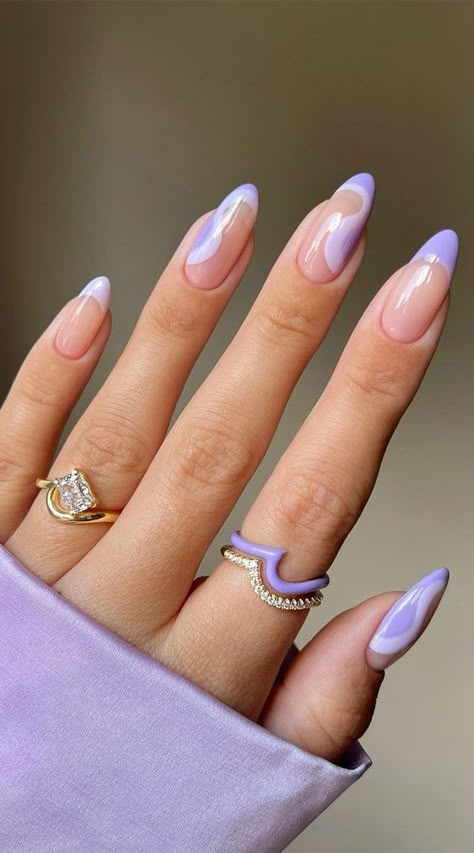 lilac wavy nails, almond nail art design, summer nail ideas, matte nails, summer nails, trendy nails Lilac Inspired Nails, Swrill Design Nails Purple, Almond Nails Designs Lavender, Lilac Colour Nail Art, Nail Inspo Almond Birthday, Wavy Nails Design, Lilac Almond Nail Designs, Almond Nails Lilac Purple, Wave Nails Design Simple