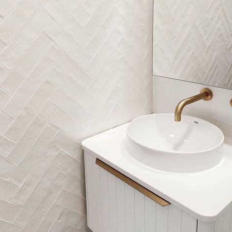 Styling tip 💡 Change up an all-white bathroom by playing with different textures like these raw finish tiles with a smooth vanity! Steal this look with: ⚪ Clay Chalk Gloss Structured 250x62mm ⚪ Vast White Satin 600x300mm 📸: @adorebathroomsandkitchens #ichosebeaumonts #ihavethisthingwithtiles #beaumonttiles #bathroomtiles Assignment Pics, Herringbone Feature Wall, White Herringbone Wall, Bathroom Feature Wall Tile, Smallest Bathroom, Herringbone Wall Tile, Washroom Tiles, Textured Feature Wall, Bathroom Feature Wall