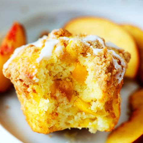 A closeup of a peach muffin with a bite taken out of it, pieces of peach visible on the inside Peach Muffin, Muffins With Streusel Topping, Peach Muffins, Streusel Topping, Cupcake Muffins, Food For Thought, Good Eats, Breakfast Brunch, Cupcake Cakes