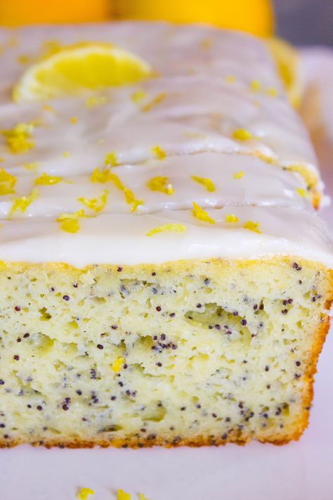 This Lemon Poppy Seed Yogurt bread is light, moist, lemony and is perfect for any time of the day! It is drizzled with a buttery lemon glaze! #lemonbread #lemon #bread #dessert #poppyseeds #lemonpoppyseeds #easytreats #easydesserts #lemonzest #lemonglaze #easyrecipes #yogurt Lemon Poppyseed Bread With Glaze, Yogurt Bread, Lemon Poppyseed Bread, Lemon Bread, Delicious Cream, Vegan Cream Cheese, Lemon Poppyseed, Easy Treats, Bread Baking