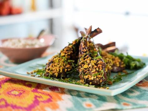 Get Pomegranate Glazed Lamb Lollipops with Feta Tzatziki Recipe from Food Network Springtime Meals, Pomegranate Lamb, Feta Tzatziki, Pomegranate Glaze, Lamp Chops, Lamb Lollipops, Tzatziki Recipe, Jeff Mauro, The Kitchen Food Network