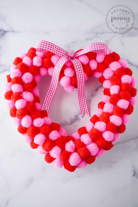 Give your front door a makeover for Valentine's Day on a budget with this DIY Dollar Tree Heart Wreath This DIY valentines day wreath only costs $5 to make and takes less than 30 minutes to put together! You can get most of the supplies for this DIY wreath at Dollar Tree. This is a fun valentine's day craft for adults to make in February and is a great DIY valentine's day decor idea. Dollar Tree Heart Wreath, Heart Doilies, Heart Wreath Diy, Burlap Diy, Grapevine Garland, Heart Shaped Wreath, Romantic Diy, Diy Valentines Day Wreath, Valentine Wreath Diy