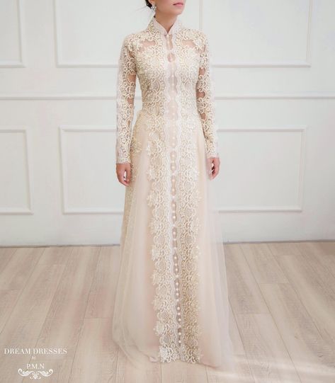 ✨Champagne Ao Dai | Vietnamese Lace Bridal Dress (#NIAH) •Custom made Ao Dai with corded gold lace •Color: champagne •Materials: chiffon, tulle, lace •Collar: 1.8in/ 4.5cm tall collar Illusion front and back •Long sleeves •Closure: zipper •Chiffon pants •Beadings: No •Details: front design with scalloped lace trim and buttons #dreamdressesbypmn #aodaivietnam Bridal Ao Dai, Vietnamese Wedding Dress, Ao Dai Vietnamese, Lace Bridal Dress, Qipao Wedding, Chiffon Pants, Wedding Dress Guide, Bridal Dresses Lace, Dream Dresses