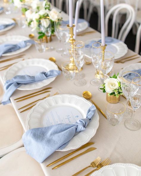 White Plate Gold Rim Place Settings, Dusty Blue Wedding Plates, Wedding Plate Setting Dusty Blue, Gold Charger Blue Napkin, Blue Charger Plates Place Settings, French Blue Table Setting, Blue Place Setting Wedding, White Charger Plates Wedding, Blue White Table Decor