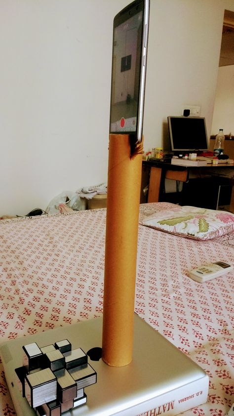 A Home Made Phone Tripod. Made from kitchen roll only. Just cut two notches on each side on the top of roll and fix the phone in it. Keep the structure on a balanced surface or hard surface. Phone Tripod Diy, Diy Tripod, Packaging Ideas Business, Phone Tripod, Red Dresses Classy, Kitchen Roll, Diy Set, Diy Crafts For Gifts, Hard Surface