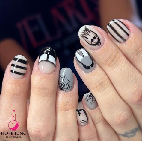 Day 2: Channeling Wednesday Addams with this spooky nail art! Perfectly macabre and oh-so-fun! 🖤💀 Use code Hope15 to save with @lightelegancehq #adamsfamily #wensdayaddams #adamsfamilynailart #lepplus #nailpro #mkenailtech #fallnails #naileducator #lightelegance #mkenails #ghostnails #waukeshanails #gelnails #nailtech #milwaukeenails #milwaukeenailtech #halloweennails Addams Family Nail Art, Wednesday Addams Nails Ideas, Addams Nails, Wednesday Addams Nails, Wednesday Addams Halloween, Spooky Nail Art, Spooky Nail, Light Elegance, Nails For Kids