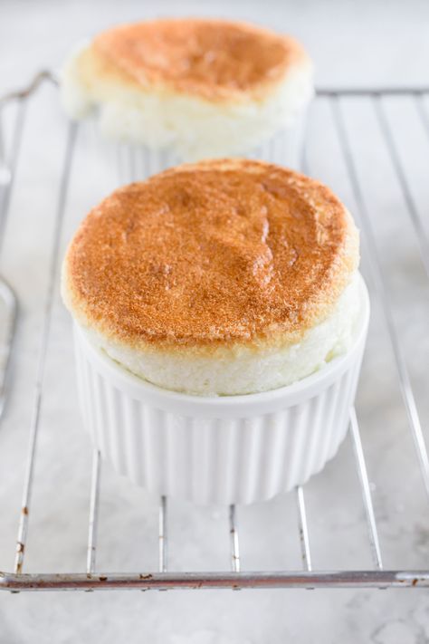 Impress your guests with a homemade vanilla soufflé. Made with butter, flour, milk, sugar, vanilla, and eggs, it is easier than you may think. Soufflé Dessert, Vanilla Souffle Recipes, Souffle Dessert, Vanilla Souffle, Moist Vanilla Cupcakes, French Vanilla Creamer, Baked Desserts, Cheese Souffle, Warm Desserts