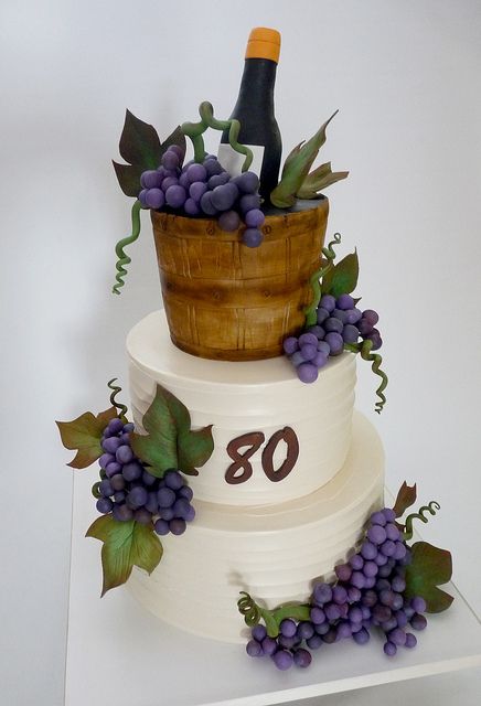 wine cake    Cake iced in buttercream, except for top tier, shaped and covered in fondant. Gumpaste grapes, leaves, vines, and wine bottle. Wine Theme Cakes, Grapes Cake, Wine Cakes, Wine Bottle Cake, Barrel Cake, Wine Cake, Grapes Leaves, Bottle Cake, Wedding Cake Photos