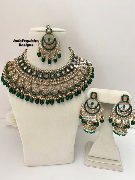 Elegant antique gold Polki bridal necklace set comes with beautiful jhumki earrings and tikka/Kundan Polki Necklace/Reception/Wedding/bridal jewelry/ Indian jewelry/Reverse AD Jewelry/Green All items are shipped from Brampton, Ontario, Canada. If you need your item by a certain day, please reach out to us for express delivery option before placing the order. We kindly request to consider minor variations in colors, shades, textures as pictures displayed may slightly vary from the actual product due to digital image limitations.Please expect the possibility of some minor imperfections when buying handmade jewelry. Please contact us for any questions you might have. Thank you and Happy shopping 😊 Green Colour Bridal Jewellery Set, Green Jewellery Set Indian, Indian Sets Jewelry, Ad Bridal Jewellery Set, Emerald Green Bridal Jewelry Indian, Bridal Jwellery Design Indian Jewelry, Green Kundan Jewellery Bridal, Green Indian Jewellery, Green Bridal Jewellery Set