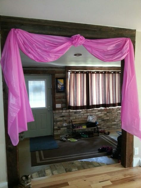 Doorway decoration for princess party made from plastic table covers Plastic Tablecloth Draping Ideas, Diy Table Cover Backdrop, Table Cloth Decorations Birthday, Dollar Tree Princess Party Decorations, Decorate With Plastic Tablecloth, Party Door Decoration Entrance Entryway, Dollar Tree Table Cloth Ideas, Dollar Tree Princess Party, Table Cover Ideas For Party