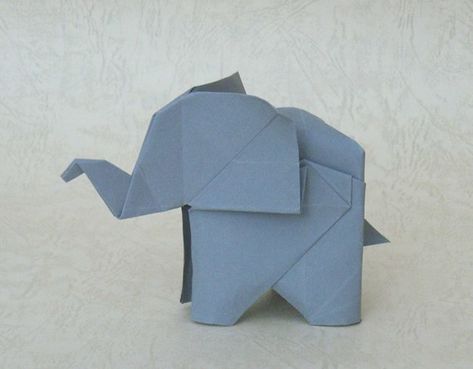 origami elephant | can anyone tell me who is the folder of t… | soneblees | Flickr Origami Elephant Tattoo, Dragon Origami, Origami Cube, Origami Elephant, Tutorial Origami, Origami Gifts, Origami Decoration, Water Coloring, Origami Dragon