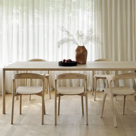 Elevate mealtimes with this Air dining table from Ethnicraft. Designed by Alain Van Havre, it features an oak veneer tabletop with solid wooden legs. Simple and minimal, it’s available in three sizes. Dining Room Tables And Chairs, Ethnicraft Dining Table, Nordic Farmhouse, Ethnicraft Furniture, Scandi Furniture, Sea Oats, Seating Storage, Nordic Dining, Farmhouse Dining Room Table