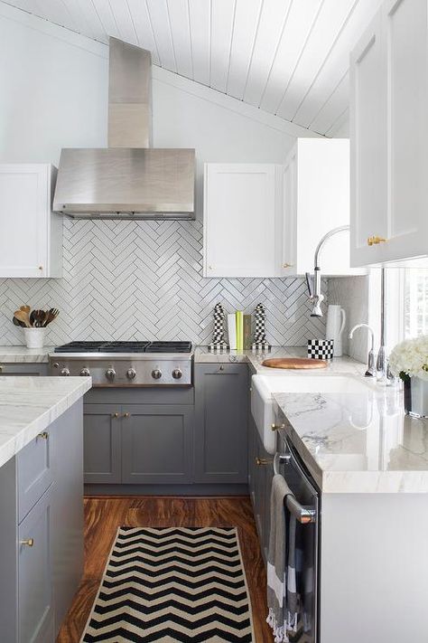 White and Charcoal Gray Kitchen with Chevron Runner White And Grey Kitchen Cabinets, Shaker Style Kitchen Cabinets, Marble Herringbone, Kitchen Cabinet Trends, Grey Kitchen Island, Herringbone Backsplash, Shaker Style Kitchens, Gray Cabinets, Farmhouse Kitchen Cabinets