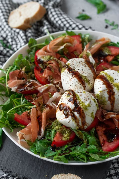 This burrata Caprese salad is a twist on a classic recipe with spicy arugula, savory prosciutto, and a tangy balsamic drizzle. Enjoy it as a shareable starter or light meal. #chelseadishes #capresesalad #burratasalad #prosciuttosalad #appetizersalad Burrata Caprese Salad, Burrata Caprese, Italian Appetizers Easy, Balsamic Drizzle, Caprese Salad Recipe, Healthy Food Habits, Dinner Restaurants, Salad Recipes For Dinner, Appetizer Salads